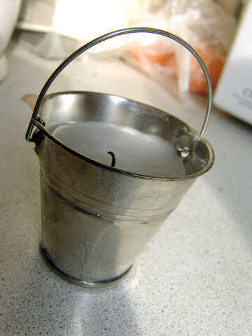 A candle in small tin pail №653