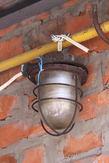 Street lamps waterproof against brick wall on the wire №510