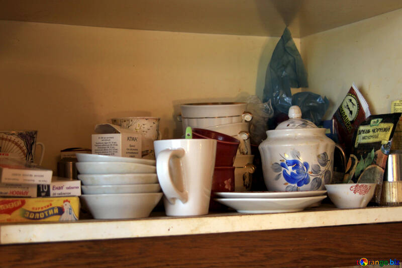 Soot on the kitchen shelf with dishes №976