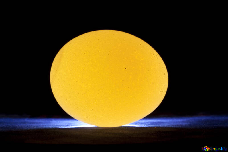 Yellow glowing egg on black background №1151