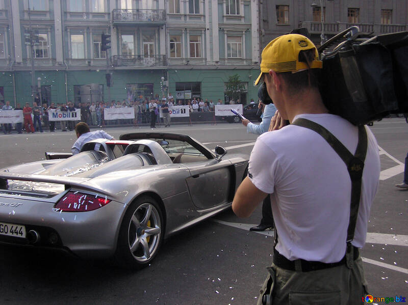 Videographer records Porsche  Carrera  GT №1163