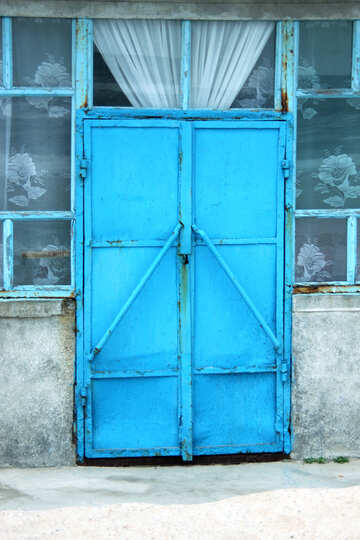 La texture des portes de fer bleu №13776