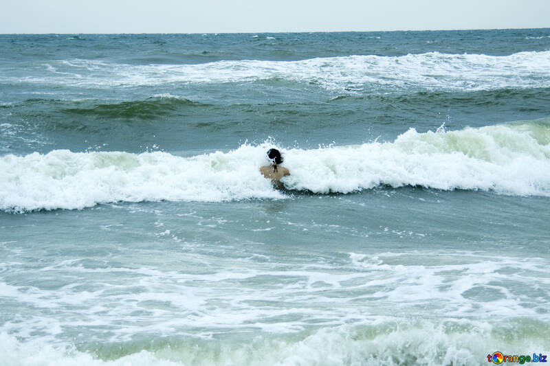 Girl dives into wave №13428