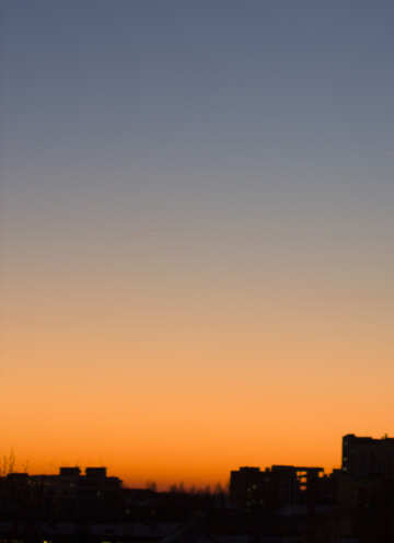 Pôr do sol sobre os telhados №16059