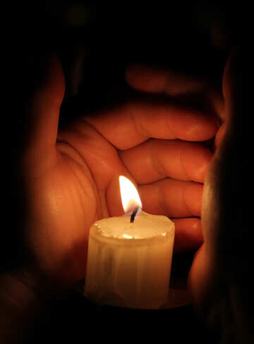 Hand over candle №18112