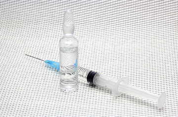 Syringe with an ampoule