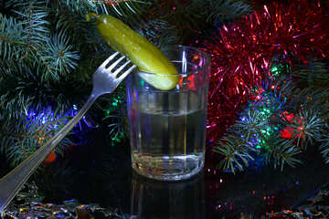 Russian vodka and pickle on fork