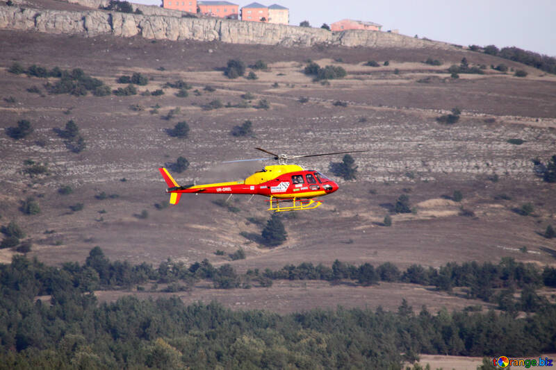 Helicopter flying in the mountains №2625