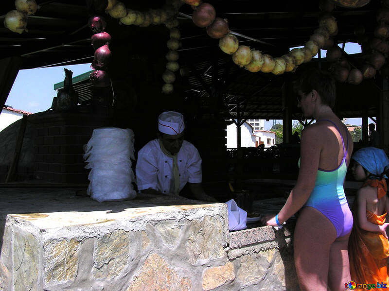 A woman in bathing suit at the beach restaurant №20713