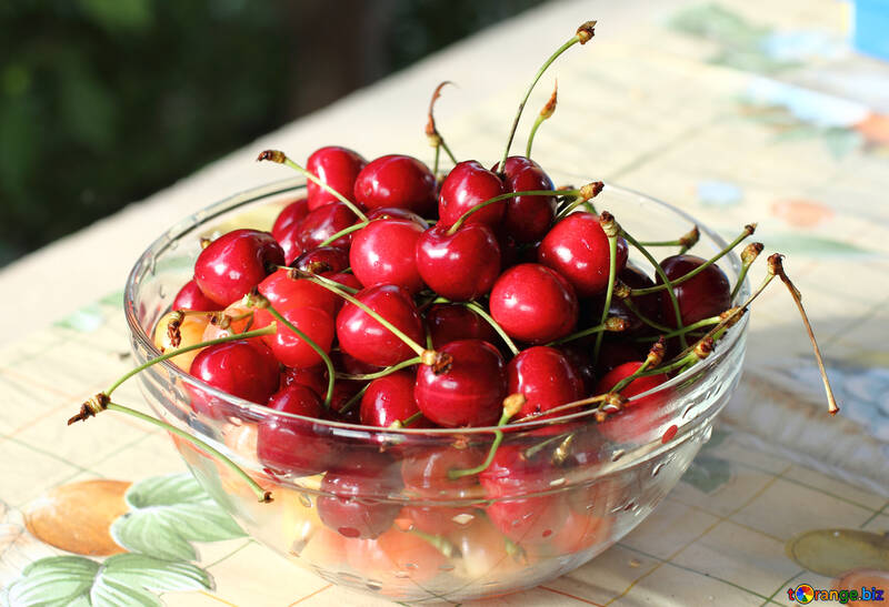 Sweet cherries in bowl on the table №22186