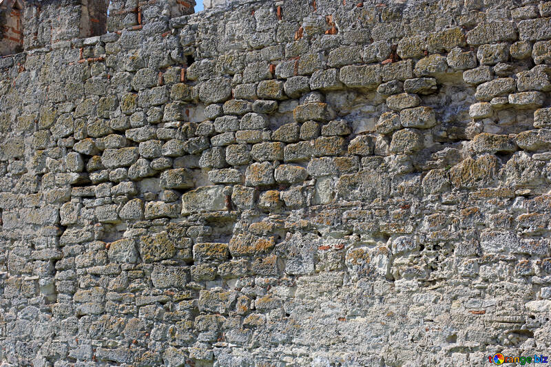 Il muro della fortezza con tracce di fuoco. №23663