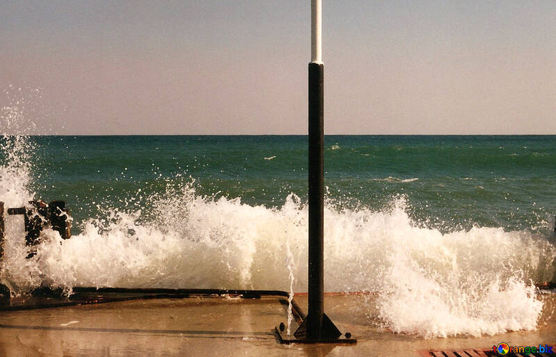Waves break on the pier №29249