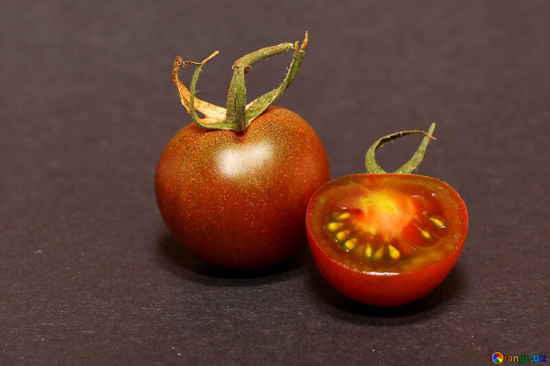 Tomatoes on dark background №32895