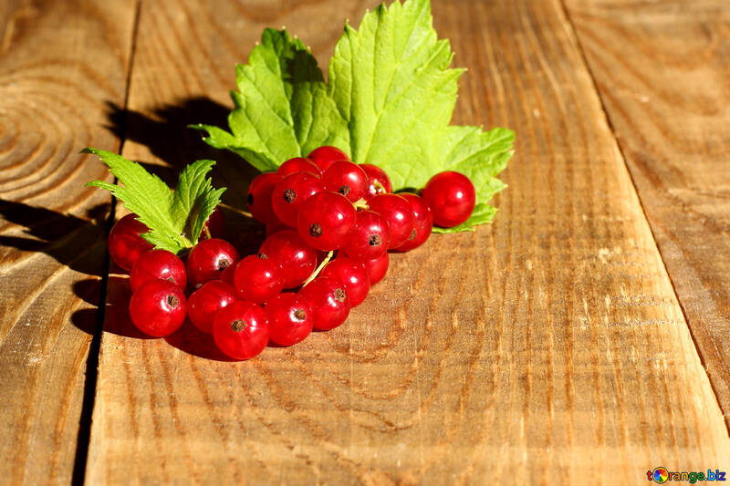 Red currant on wooden background №33213