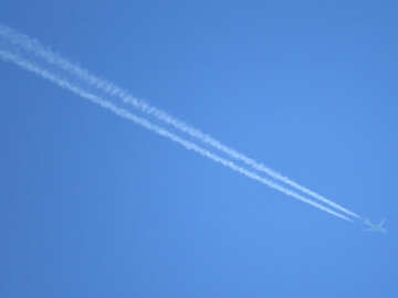 The plane with white trace №34530
