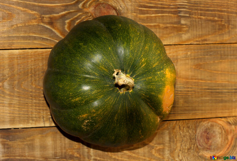 Green pumpkin on the table №35209