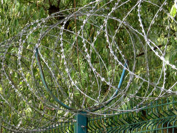 A fence with barbed wire №36171