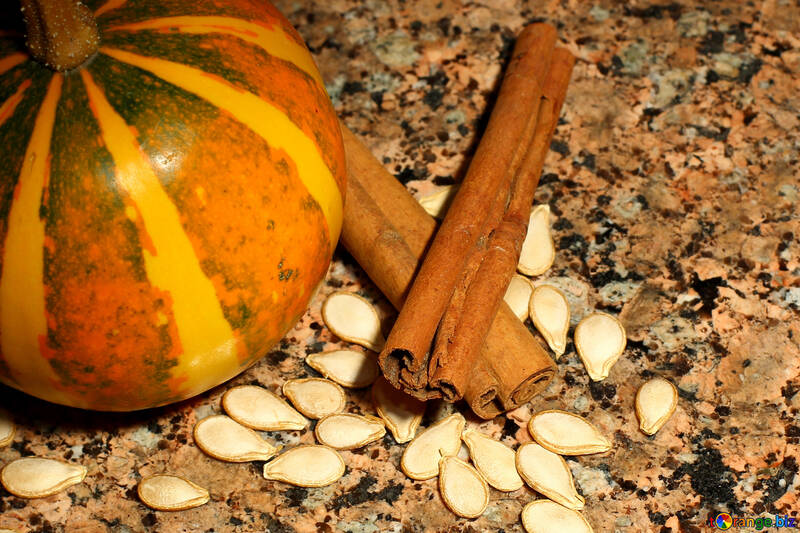 Background with pumpkin seeds and cinnamon №36057