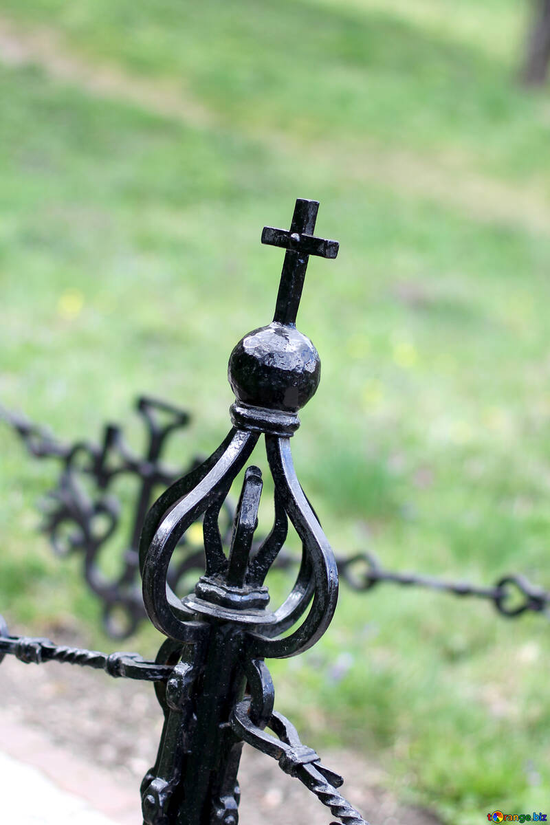 Metal cross on the fence №39885