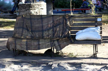 Blanket and pillow on bench №41764