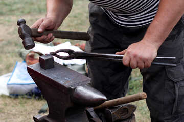 Blacksmith forges iron №42445