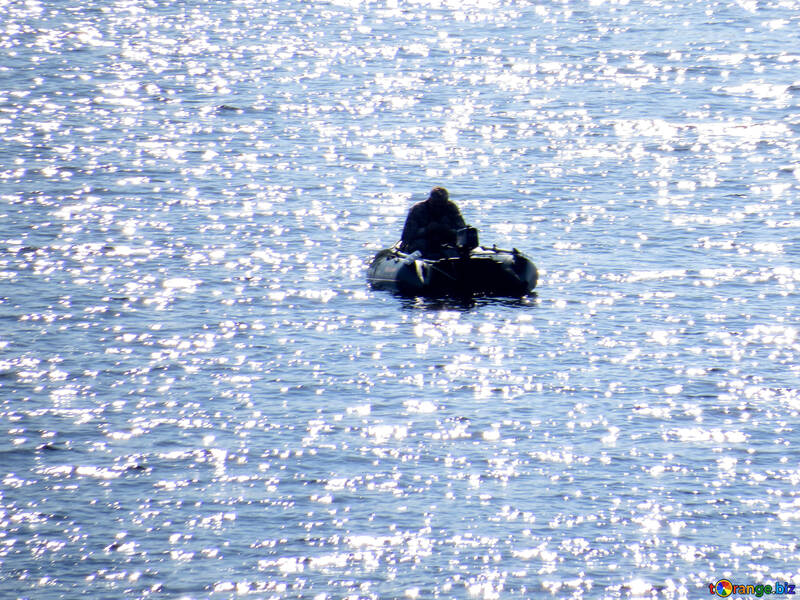 Fisherman on the inflatable boat №42504