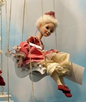Porcelain Doll on swing №44553