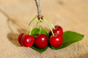 Cherry berries on the wooden background №46248