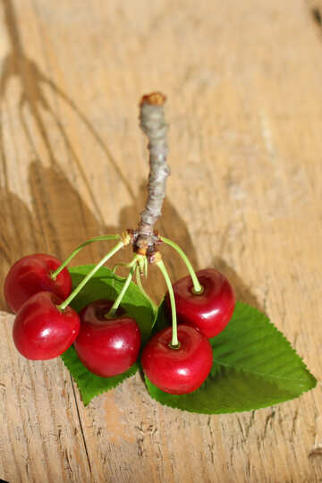 Cherry berries on the wooden background №46250
