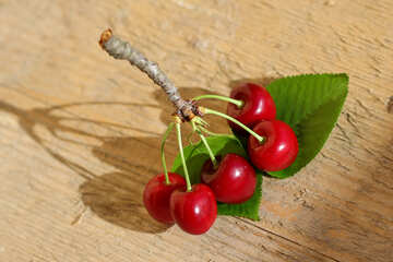 Cherry berries on the wooden background №46251