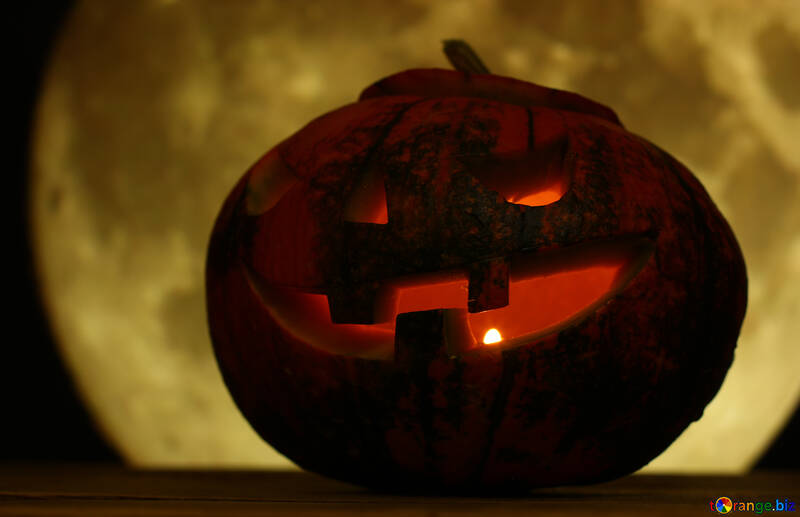 Halloween pumpkin on a background of a large round moon №46178