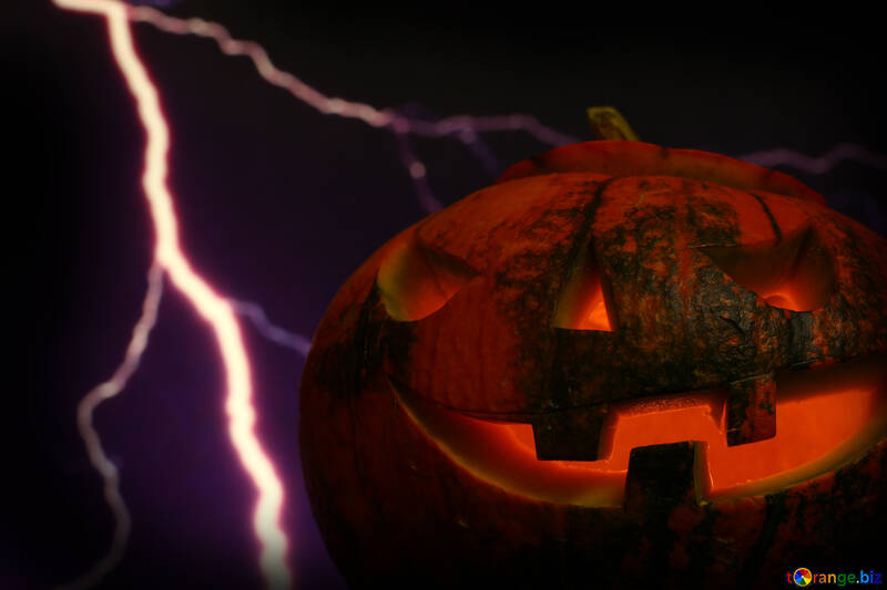 Halloween pumpkin on the background of lightning №46186