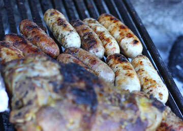 Sausages and meat on the grill №47435