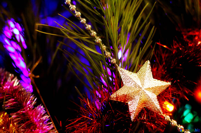 Star garland ornament on a Christmas tree №47939