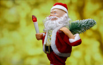Neujahrskarte mit fröhlichen Weihnachtsmann-Spielzeug bringt Weihnachtsbaum zu glühen gold Bokeh Hintergrund. <font>Space-Konzept für die Markt Banner, Poster, Glückwunschkarte.</font> №48151