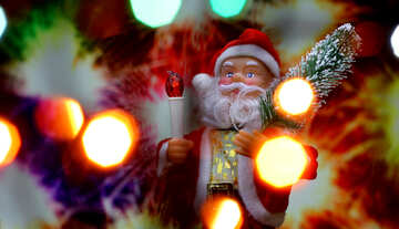 Nueva tarjeta con el juguete del `s de Santa Claus trae árbol de Navidad en el fondo del bokeh brillo chispas en los colores de la bandera francesa. <font>concepto contexto para la bandera de mercado, el cartel, felicitaciones.</font> №48169