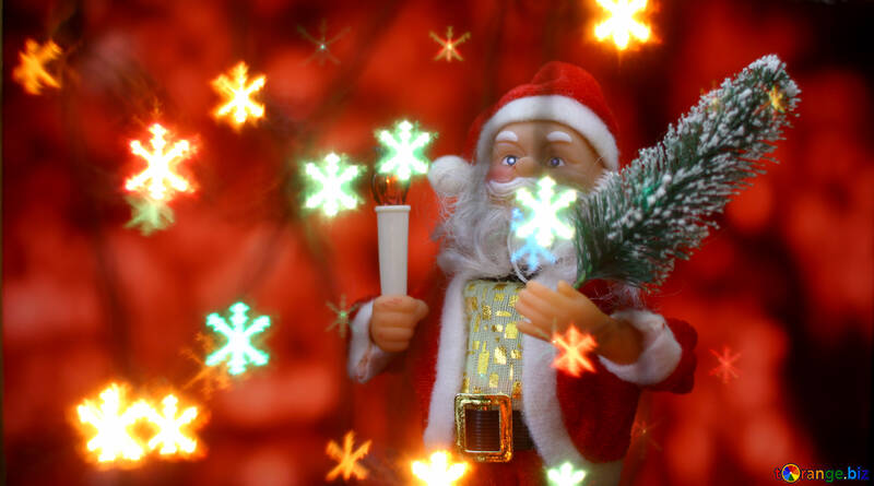 Santa Claus toy brings Christmas tree at glow red bokeh background and blurred lights snowflakes foreground. Big Copyspace concept New Year`s market banner, poster. №48173
