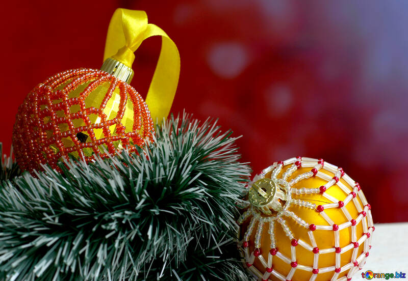 Christmas balls decorated with beads on a blurred background №48065