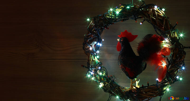 Corona de Navidad con un fondo gallo con el espacio para el texto №48034