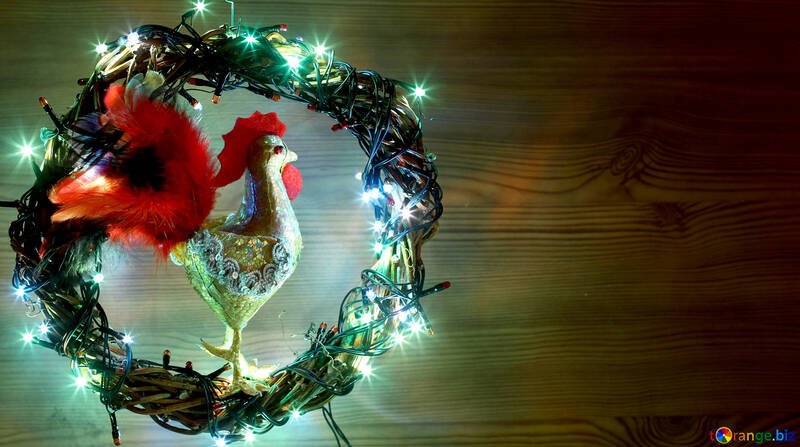 Corona de Navidad con un fondo gallo con el espacio para el texto №48039