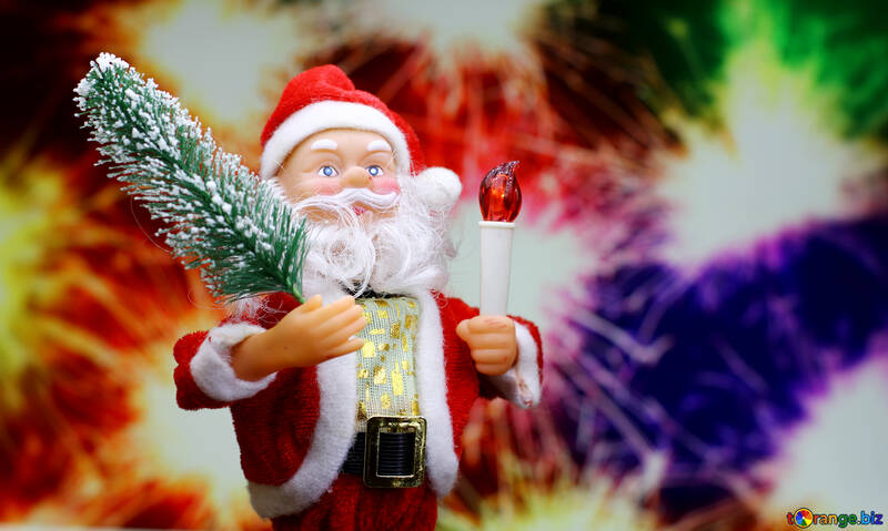 New Year`s card with Santa Claus toy brings Christmas tree at glow red bokeh background . Big Copyspace concept for New Year`s market banner, poster, congratulations. №48167