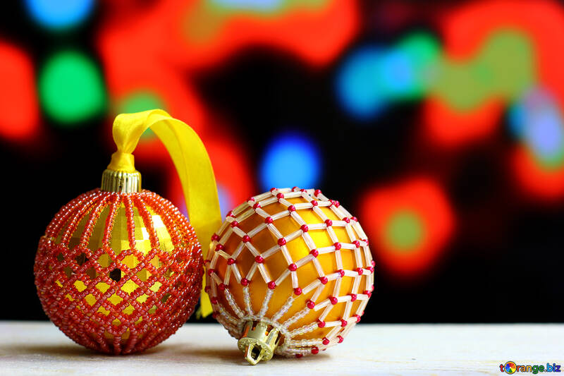 Christmas balls decorated with beads on a blurred background №48060