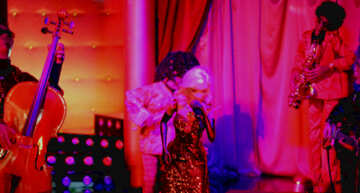 Coppia attore sul palco sotto l`illuminazione calda rosa donna uomo №49296