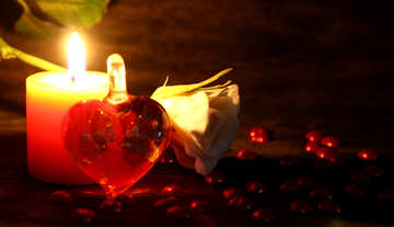 Kerze und ein Herz aus Glas №49213