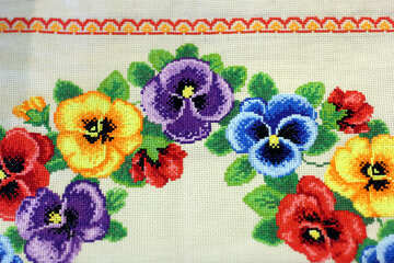 Pansy flowers embroidered on the fabric №49107