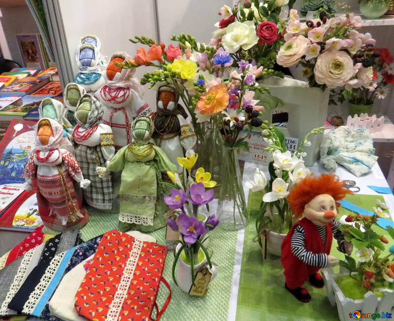 Dolls, trinkets, flowers, gifts, as if at a shrine №49087