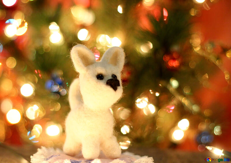 Symbol of new years 2018 white husky dog. New years greetings background. Fancy handmade toy from wool on bokeh Christmas background. Place for insert logo or write text. Copyspace for congratulations. №49642