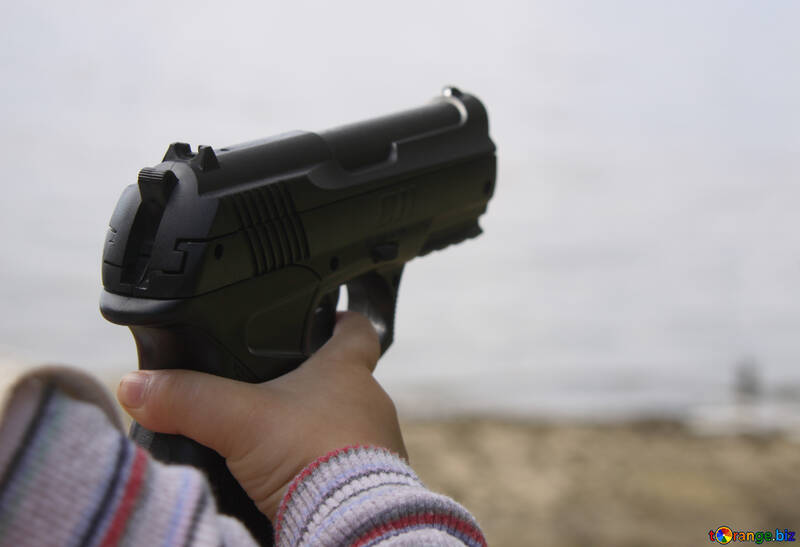 The gun in the hands of child №5435