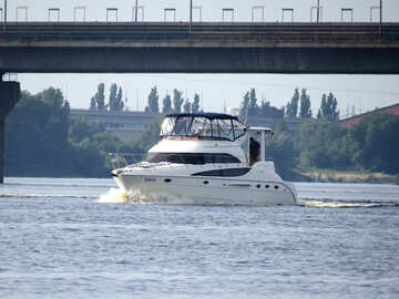 Yacht sailing under a bridge boat water №50714