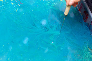 water blue surface pierced by sharp object №50934